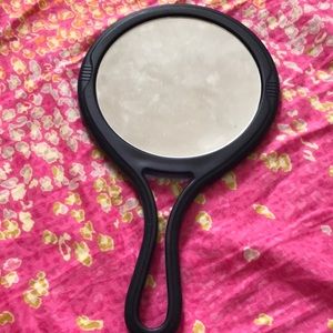 Hand held mirror